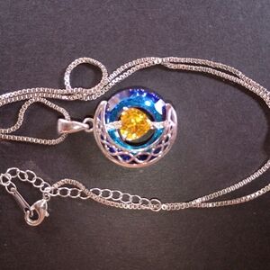 Elegant Silver Necklace with Blue and Yellow Accents